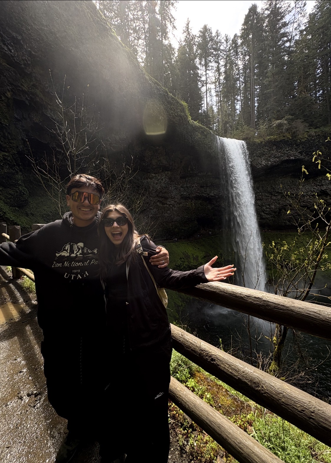 Eduardo and Leonor Lopez together by a waterfall